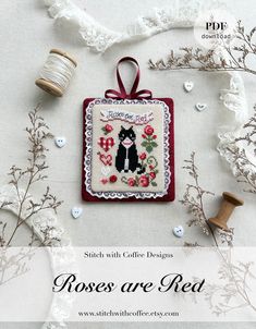 the cross stitch pattern has been designed to look like a cat