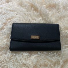 Lovely Wallet And Phone Case Combo By Kate Spade. Black Saffiano Leather With Gold Tone Hardware. In Excellent Condition Other Than Hardware Not Looking Brand New. Has Loop For Wristlet Attachment, Deep Pocket For Phone, Many Credit Card Slots, Etc Black Saffiano Leather Wallet For Everyday Use, Classic Rectangular Kate Spade Wallet, Kate Spade Black Evening Wallet, Luxury Rectangular Kate Spade Wallet, Kate Spade Black Leather Wallet, Elegant Black Kate Spade Wallet, Kate Spade Black Rectangular Wallet, Black Phone Case, Wallet Phone Case