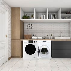 a washer and dryer in a room with white tile flooring on the walls