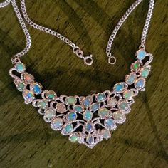 Amazing Ethiopian Opal Sterling Silver Bib Necklace. Bib Is 3 Inches Across And 1.5 Inches Down. Necklace Is 20 Inches Long. Bib Necklace, Ethiopian Opal, Womens Jewelry Necklace, Opal, Jewelry Necklaces, Women Jewelry, Necklaces, Sterling Silver, Silver