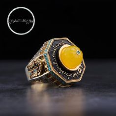 Jerusalem Silver Men's Ring, The Dome of the Rock is engraved on our ring that addresses the Sahara, Jerusalem. The dome of our silver inlaid ring is made of Katalin Amber. It is decorated with a semi-precious turquoise stone, and the 12th verse of SURE ALI IMRAN is engraved on the upper part of our ring. Ali İmran Suresi 12. ayet( Say to those who disbelieve; You will soon be defeated and driven to hell. what a bad place to stay) * Handmade product * Shipments from a small business in Turkey Tu The Dome Of The Rock, Mens Silver Ring, Turkish Rings, Special Ring, Amber Ring, Jewelry Stone, Amber Stone, Ring Stone, Mens Silver Rings