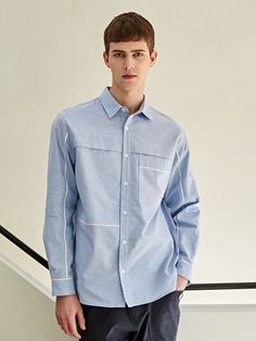 Editor's notesIt is a semi-oversized fit shirts with piped-trim detail and flap on the top of the front. The 100% cotton chambray oxford fabric gives soft and comfortable feel. The logo embroidery on the front makes the shirt more sophisticated.- Chambray oxford fabric- Piped-trim point- Flap on the front- Pocket on the front- Button closureMeasurements(in.)M / L / XL- Shoulder: 19.1 in. / 19.7 in. / 20.5 in.- Chest: 45.3 in. / 47.2 in. / 49.6 in.- Length: 30.1 in. / 30.7 in. / 31.5 in.- Sleeve Casual Cotton Shirt With Contrast Stitching, Casual Collared Tops With Contrast Stitching, Cotton Tops With Contrast Stitching And Relaxed Fit, Spring Cotton Shirt With Welt Pockets, Spring Cotton Shirt With Patch Pockets, Leather Label, Men Shirt, Oxford Fabric, Oxford Shirt