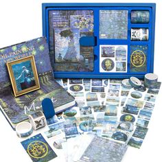 the contents of a blue box with pictures and other items