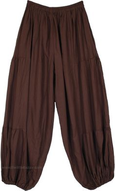 These perfect pair of loose rayon harem pants - without the usual tie-dye - might just be what you need for the season, with their comfy fabric and snug waist they are sure to make you feel great - whatever your mood.  The pants have an elastic waist and elastic on the ankles for ease of comfort. #tlb #SplitSkirtsPants #Yoga #hippieharempants #gypsyhippiepants #hippiewidelegpants Harem Pant Outfits, The Little Bazaar Pants, Loose Flowy Pants, Bohemian Brown Harem Pants For Spring, Brown Bohemian Ankle-length Harem Pants, Bohemian Brown Ankle-length Harem Pants, Solid Cotton Bohemian Harem Pants, Brown Ankle-length Harem Pants With Elastic Waistband, Solid Bohemian Cotton Harem Pants