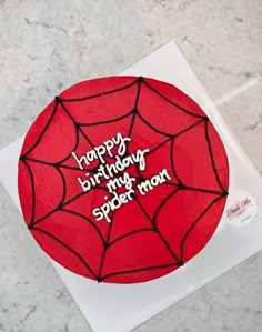 a spiderman birthday cake with the words happy birthday on it