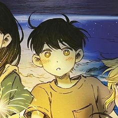 three young people standing next to each other near the ocean and stars in the sky