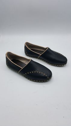 Genuine leather custom made unisex flat shoes. #loaferwomen #loafermen #flatsandals #leatherfashion Leather Slip-on Slippers For Galas, Leather Flat Moccasins With Soft Sole, Leather Moccasins With Soft Sole, Casual Vegetable-tanned Leather Slip-on Shoes, Leather Slip-on Loafers With Soft Sole, Leather Loafers With Soft Sole In Slip-on Style, Artisan Leather Shoes With Stitched Sole And Round Toe, Traditional Leather Slippers With Rubber Sole, Handmade Leather Flats With Flat Heel