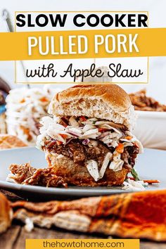 slow cooker pulled pork with apple slaw on a plate next to coleslaw