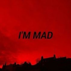 the words i'm mad written in black on a red sky