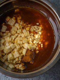 the ingredients for homemade salted caramel apple granola are in a large pot