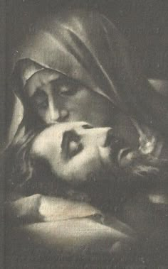 a black and white photo of a woman with her head on a man's shoulder