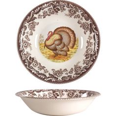 a white bowl with a turkey on it and a plate in the shape of a bowl