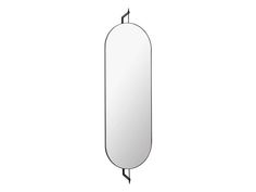 an oval mirror hanging on the wall next to a metal hook with a black handle