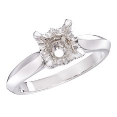 a white gold ring with a diamond center