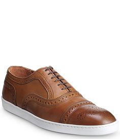 From Allen-Edmonds&#x2C; the Men's Strand Sneakers feature: Leather lined premium calfskin leather upperBuilt on the welted 65C LastFlyForm™ removable insole provides enhanced support and shock absorptionFlexible and comfortableLow profile durable rubber cup soleTheir best-selling Strand&#x2C; now available as a sneakerSix-eyelet lace-up oxford dress sneaker with brogue detailsDress casual style&#x2C; perfect any way you wear itRelaxed Fit&# Classic Low-top Formal Golf Shoes, Semi-formal Low-top Leather Oxfords, Masculine Leather Business Sneakers, Masculine Business Leather Sneakers, Business Leather Sneakers, Leather Business Sneakers With Removable Insole, Business Leather Sneakers With Removable Insole, Brown Leather Oxfords With Removable Insole, Classic Brown Business Sneakers