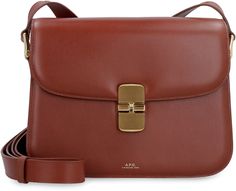 Indulge in luxury with this exquisite leather crossbody bag. Crafted from smooth, high-quality cowhide, it features a flap with a snap closure and gold-tone metal hardware, exuding elegance and sophistication. The adjustable shoulder strap allows for versatile styling, while the three internal compartments provide ample space to keep your essentials organized. Whether you're heading to a chic brunch or a glamorous evening event, this Grace Leather Crossbody Bag is the perfect accessory to elevat Saddle Brown, Leather Handbags Crossbody, Cow Hide, Leather Cap, Leather Pieces, Leather Items, Metal Hardware, Browning, Handbag Accessories