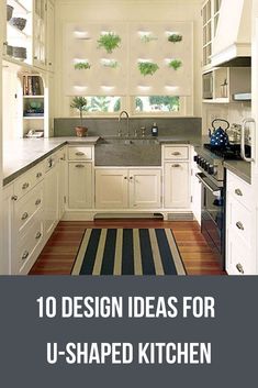 the interior of a kitchen with white cabinets and striped rugs on the wooden floor