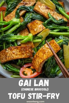 tofu and vegetables in a bowl with chopsticks