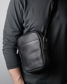 This timeless men’s crossbody bag maintains a classic shape that never goes out of style. Designed with a long strap, it can be worn comfortably as a shoulder or crossbody bag, perfect for when you’re on the move. The bag boasts a discreet and minimalist design, made from durable genuine leather, featuring a reliable YKK metal zipper from Japan, waterproof lining, and premium metal hardware. Size: 8.3 x 6.3 x 1.6 inches. Cheap Men's Crossbody Chest Bag, Modern Anti-theft Crossbody Shoulder Bag, Small Man Bags, Leather Anti-theft Crossbody Bag, Black Anti-theft Crossbody Bag, Mens Crossbody Bag, Cheap Men's Shoulder Bag With Anti-theft Pocket, Designer Crossbody Bags, Metal Accessories