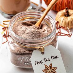 a glass jar filled with chai tea mix