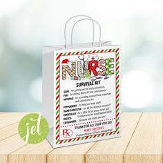 a white shopping bag sitting on top of a wooden table