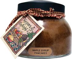 maple syrup pancakes in a glass jar with a tag on the front and label attached to it