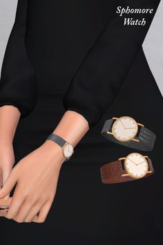 two wrist watches sitting next to each other on a woman's arm with her hands in the air