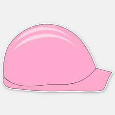 a pink hard hat sticker sitting on top of a white surface with no background