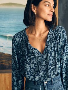 Emery Top - Blue Esna Floral | Faherty Brand How To Dress Like An Artist, Bohemian Smocked Top With Floral Print For Vacation, Bohemian Smocked Top With Floral Print, Bohemian Smocked Bodice Top For Daywear, Bohemian Blouse With Ruffles For Gatherings, Bohemian Tops With Smocked Bodice For Daywear, Bohemian Smocked Top For Brunch, Bohemian Blouse With Smocked Bodice For Vacation, Bohemian Printed Tops For Daywear