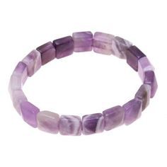 Thought to magnify and liberate the heart's capacity for joy agate takes center stage in this charming stretch bracelet. Swirling purple and white gemstone beads align creating a textured appearance. India's Narayani presents this bracelet as a feature piece for your accessories drawer.