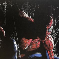 a drawing of a spider man in the dark