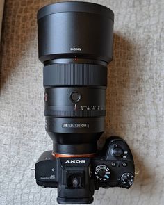 a camera lens sitting on top of a table