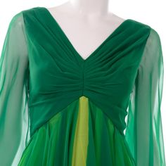 Green Chiffon Evening Dress For Summer, Elegant Green Flowy Chiffon Dress, Green Long Sleeve Chiffon Evening Dress, Elegant Flowy Green Chiffon Dress, Green Chiffon Evening Dress For Spring, Green Fitted Chiffon Dress, Fitted Green Chiffon Dress, Spring Green Chiffon Evening Dress, Green V-neck Chiffon Evening Dress