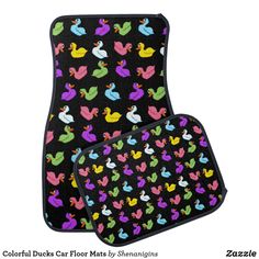 two car mats with colorful ducks on black and white background, one is for the floor