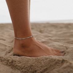 Having perfect style is no small feet—-but our Ventura Stretch Bead Anklet can help make it happen! Available in a turquoise and silver color combo, this slip-on style features delicate heshi beads that’ll have you glimmering from head to toe. Silver Ankle Wrap Bracelets For Beach, Silver Flexible Anklets For Summer, Summer Bracelets With Tiny Beads, Silver Beach Anklets With Silver Beads, Adjustable Silver Anklets For Beach, Silver Adjustable Anklets For The Beach, Beach Silver Anklets With Silver Beads, Silver Anklets With Tiny Beads For Beach, Silver Anklets With Beads For Beach