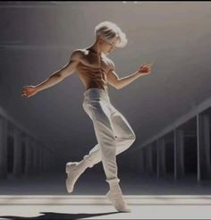 a man in white pants and no shirt is dancing with his arms spread out to the side