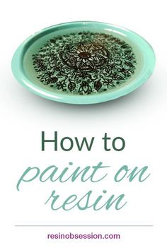 a green plate with the words how to paint on resinin in white and blue