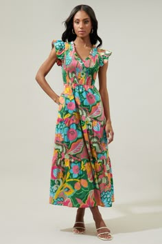 If the life of the party were a dress, this would be it. This multicolored tropical floral print works to decorate the Sunfire dress. Lightweight cotton allows you to do your thing all day. It features a flattering smocked bodice with a ruffle V neckline, framed by ruffle cap sleeves. It maintains a fit and flare silhouette with a tiered maxi skirt.- Smocked bodice- Breathable- Pockets- Cap sleeves- Color: Kelly Pink MultiSize + Fit - Model is 5'10" and wearing size XS- Measurements taken from s Guest Ideas, Colorful Wardrobe, Fiesta Tropical, 2023 Wishlist, Kimono Sweater, Queen Fashion, Tiered Maxi Skirt, Blouse Tank Top, Tropical Floral Print