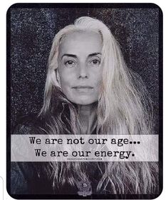 a woman with long blonde hair and a quote on her face that says, we are not our age we are our energy