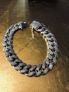 FAST SHIPPING!*TRUSTED SELLER**2300+ TRANSACTIONS* -Will be shipped through USPS with First Class Mail that includes tracking so you'll get it quick! -Don't confuse this with those cheap low quality cuban links that have glued in stones. -Premium 14k white gold OR yellow gold plated diamond cuban link Bracelet! -Plating is PVD which is the highest quality. -Stones are high quality VVS simulated lab diamonds(CZ)! Hand prong set and not glued in like the cheap ones! -Very nice box clasp! -12mm wid Cuban Link Bracelet, Expensive Jewelry Luxury, Miami Cuban Link, Affordable Watches, Miami Cuban, Box Clasp, Expensive Jewelry, Cuban Link, Lab Diamonds