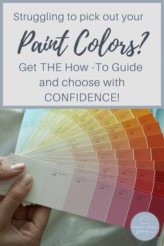 a person holding up a color guide with the words, struggling to pick out your paint colors? get the how - to guide and choose with confidence