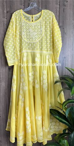 Beautiful and classic yoke Anarkali on soft cotton with a big flare. Hand embroidered Chikankari. Anarkali Length-52 inches Liner included. Yellow Cotton Anarkali Set With Floral Embroidery, Yellow Anarkali Kurta With Chikankari Embroidery, Yellow Cotton Anarkali Set With Zari Work, Cotton Anarkali Set With Floral Embroidery, Summer Cotton Anarkali Set With Cutdana, Summer Cotton Salwar Kameez With Cutdana, Semi-stitched Yellow Cotton Anarkali Set, Yellow Semi-stitched Cotton Anarkali Set, Yellow Cotton Anarkali Set Ready To Tailor