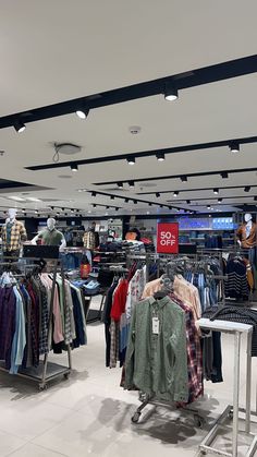 a clothing store filled with lots of clothes