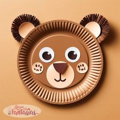 a paper plate with a bear face on it