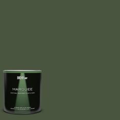 a green paint can with the words marquee on it