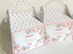 two boxes with pink flowers and polka dots on them, one is for mother's day