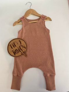 Ribbed Knit Handmade Baby Romper Jumpsuit. Size 9-12 months. Made with a lightweight ribbed knit cotton perfect for the warmer weather. Hand made in the Yarra Valley. Cotton Ribbed Onesie In Solid Color, Ribbed Cotton Onesie, Solid Color Cotton Ribbed Onesie, Casual Ribbed Onesie For Loungewear, Casual Ribbed Onesie, Casual Cotton Ribbed Onesie, Yarra Valley, Romper Jumpsuit, Cotton Romper