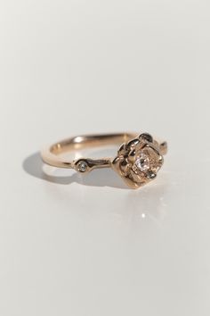 The Rosette ring features a sculptural rose that holds an antique, old-mine cut diamond in the center of it's petals, and is accented by two diamonds on the sides. Approx .14ct total for the three diamonds. The rose is approx 9mm in diameter. I designed this ring to be easily customizable. Whether that be by using the birthstones of your choice, or heirloom diamonds you inherited from a loved one, please send us an email here if you'd like to personalize this design. Made to order, please leave Scrap Material, Design Master, Sustainable Fashion Brands, Recycled Gold, The Rose, White Roses, Leather Purses, Sustainable Fashion, Sale Items