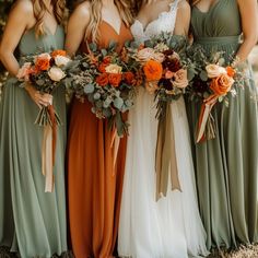 three bridesmaids in long dresses holding bouquets with orange and green flowers on them