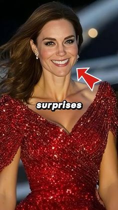 a smiling woman in a red dress with the words surprise on it's chest